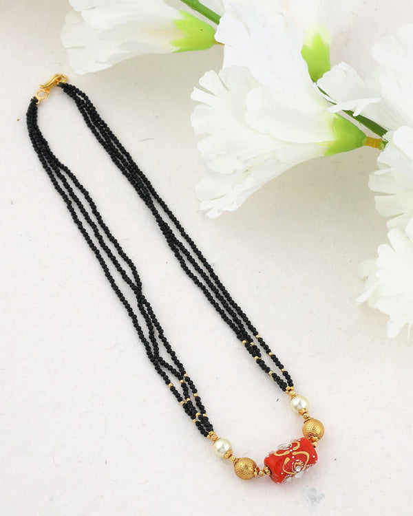 NS650 - Coral Black Beads